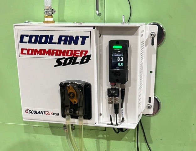 Coolant Commander SOLO wall-mounted with digital refractometer displaying 8.3 percent actual and 8.0 percent target concentration